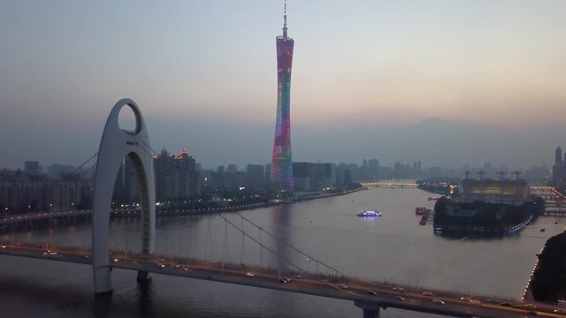 sunset guangzhou city canton tower liede bridge river island aerial panorama 4k china
