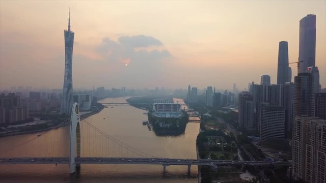 sunset sky guangzhou city canton tower liede bridge river aerial panorama 4k china
