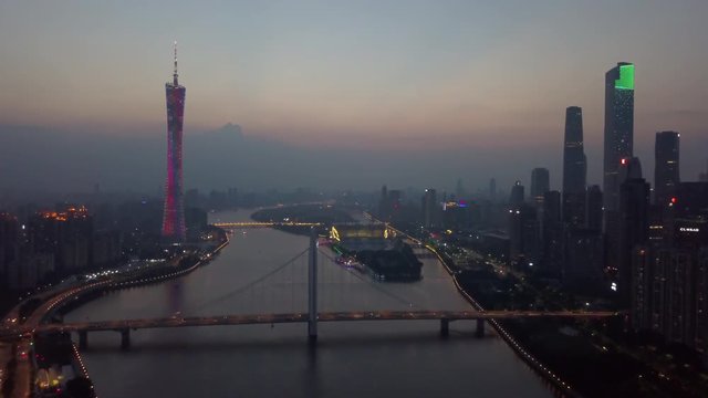 night illuminated guangzhou downtown canton tower river bridge aerial panorama 4k china
