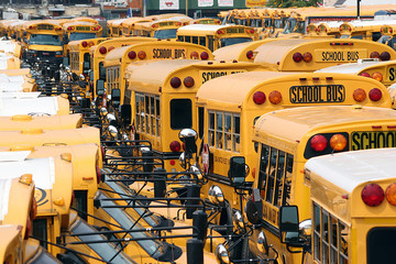 American school buses in bus depot, New York