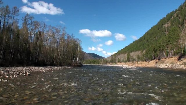 River rapids in Mountain and forest of Siberia of Russia. Border of Baikal State Nature Biosphere Reserve.