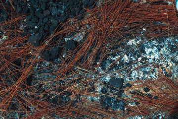 Metal carcass of the burnt automobile rubber tire