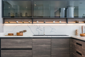 Modern kitchen interior at home with kitchenware - obrazy, fototapety, plakaty