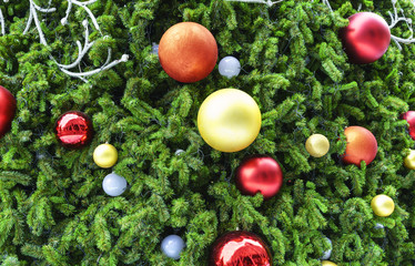 Fototapeta na wymiar Christmas concept : Decorated artificial Christmas tree and Christmas balls