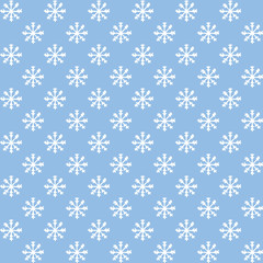 Hand drawn vector white snowflakes seamless pattern on the blue background. Winter decoration.