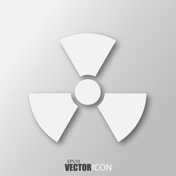 Radiation icon in white style with shadow isolated on grey background.