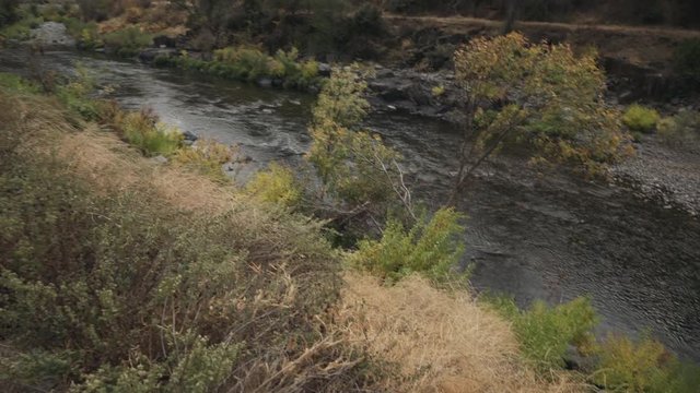 gimbal pan shot of merced river landscape