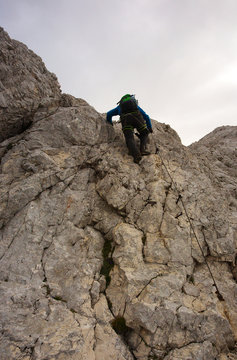 Climbing tourist on the via ferrata, Triglav National Park, Slovenia