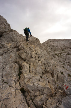 Climbing tourist on the via ferrata, Triglav National Park, Slovenia