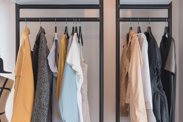 modern style wardrobe with clothes