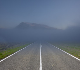 Morning view point with mountain mist and road