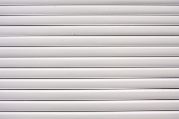 Fototapeta premium Windows with closed blinds on old building
