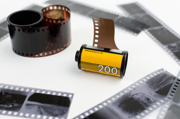 the roller 35 mm film on white background, black and white negatives
