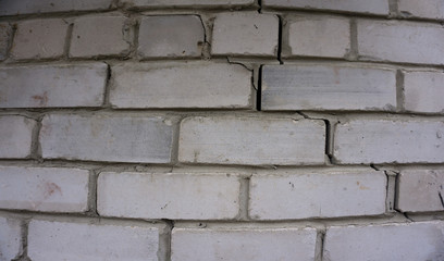 Neatly stacked rough cut stone wall seamless texture background.