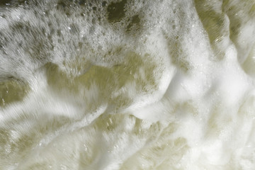 Stop action Churning sea water with high shutter speed