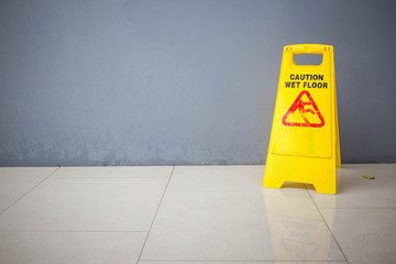 Wet floor caution sign.