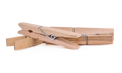 Wooden clothespins isolated on white background