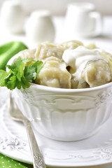 Pelmeni (dumplings stuffed with minced meat)-  traditional dish of russian cuisine.