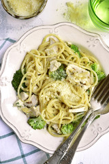 Spaghetti with broccoli,chicken fillet and parmesan.