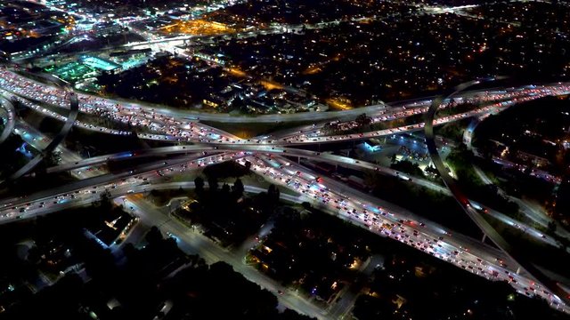 Aerial view of the 405 and 110 highway intersection in Downtown Los Angeles in 4K from a helicopter