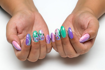 Wedding mint pink, purple manicure with painted flowers, stripes and circles on long oval nails

