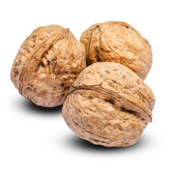 three whole walnuts isolated on white background. clipping path