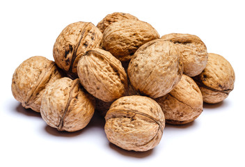 pile of walnuts isolated on white background