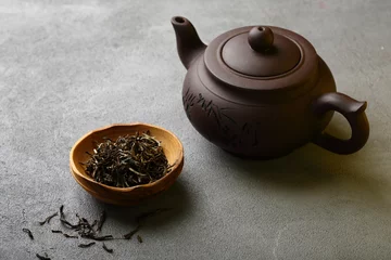 Foto op Aluminium Brown teapot and green tea in bowl © Olha Afanasieva