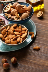 Almond nuts and walnuts in bowls