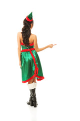 Back view of woman wearing elf clothes pointing to the right