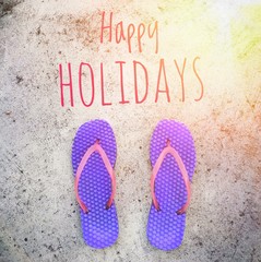 Slippers / flip flops / shower sandals in purple and pink color on cement floor;  