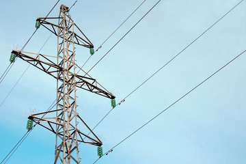 fragment metal power pole and wires against the sky