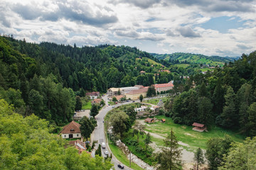 View of the Bran Village on a summer day from the balcony of Bran Castle, as known as Dracula's Castle, Transylvania, Romania.