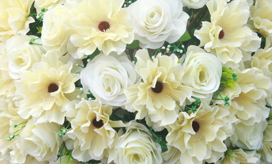 white and yellow color fake flower for background