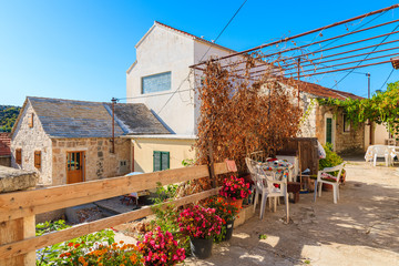 Street with typical houses in old town of Rogoznica, Dalmatia, Croatia