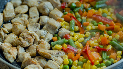 Chicken with vegetables small depth of field