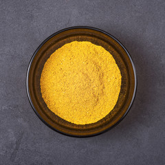 Spice mix - turmeric, pimento, chili, coriander, cardamom, cinnamon, cloves, cumin in a bowl