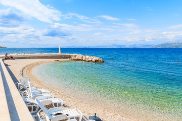 Obraz premium View of beach with turquoise sea water in Postira village, Brac island, Croatia