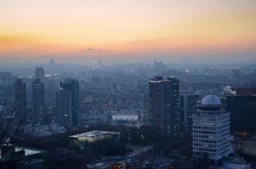 Fototapeta premium Cityscape at N Seoul Tower during the sunset. Panorama from the top of Seoul, South Korea