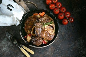 Ossobuko beef with onions, carrots, celery, white wine and thyme.