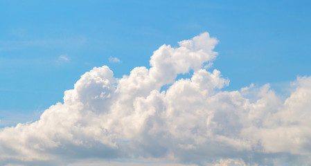 Naklejka na ściany i meble White cloud on blue sky. Cloudscape photo background.