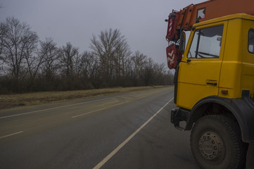 truck crane on highway roadside