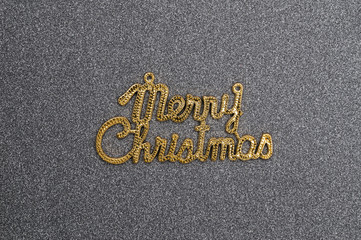 Fototapeta na wymiar Merry christmas text on black gift box cover