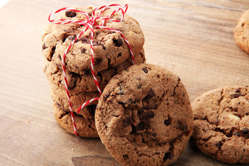 Chocolate cookies on wooden table. Chocolate chip cookies.