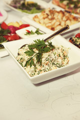Russian traditional salad olivier on a table