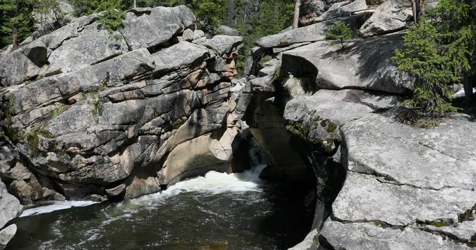 Colorado Devil's Punchbowl Roaring Fork River waterfall. Grottos climbing cliffs along Roaring Fork River near Independence Pass and Aspen Colorado. Swimming hole at Devil's Punchbowl.