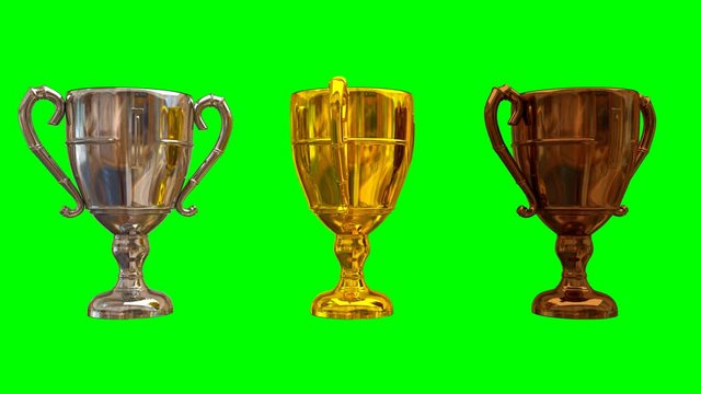 Animated plain silver, gold and bronze trophy with handles and shining surface finish spinning against green background. isolated and loop able.