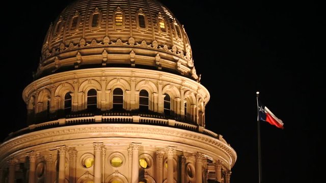 Lonestar State Flag Waves Austin Capital Building Night