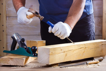 Man with carpenters tools construction concept.