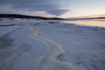sunset over Deer Lake Icy shore